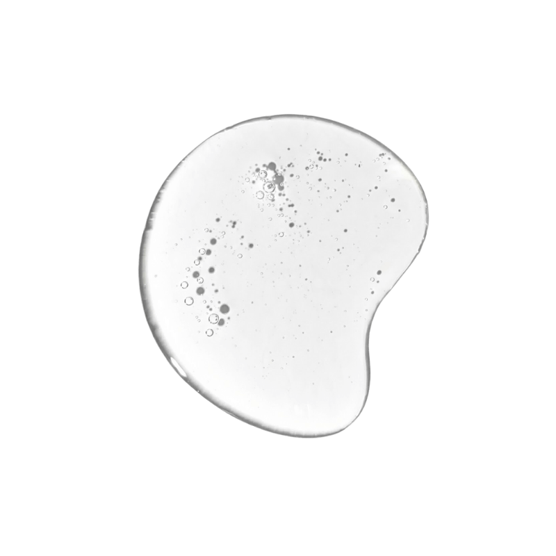 Close up of clear salicylic acid BHA serum texture for treating acne and blackheads.